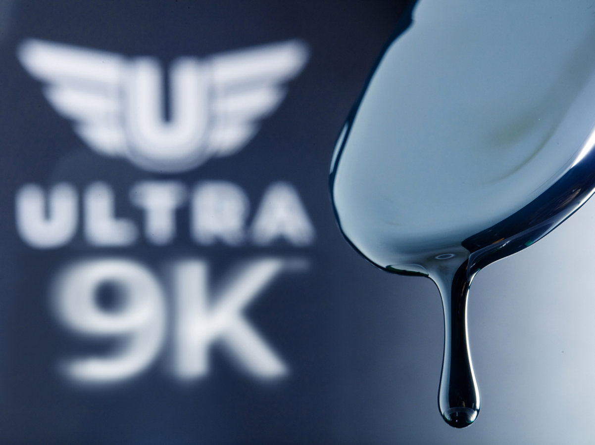 Official logo of Sherwin-Williams, professional automotive paint brand, blue and white globe icon with pouring paint, high resolution, white background, centered